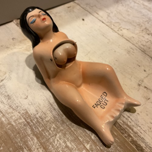 Fagged out ashtray with three - out,