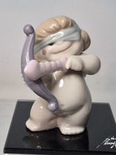 NAO by Lladro AIMING FOR LOVE