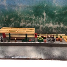 Joblot station platform canopy cargo passengers kiosk barrels cycle rack + more.