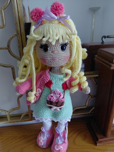 Crocheted doll with - ,