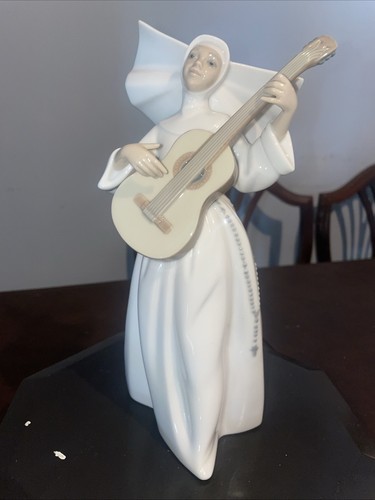 Lladro sister with - sister, guitar
