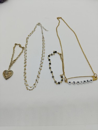 Gold tone costume jewellery - tone,