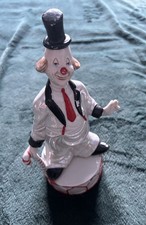 Porcelain Clown Musical figurine by J.B.G. Spins rotates 
