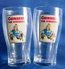 TWO Guinness Pint Glasses  ' Guinness for Strength'  Vintage 1990s. Man's Cave