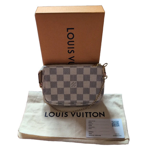 Pre owned louis vuitton mini - louis,