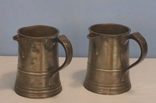 Pair of antique quart pewter pouring tankards, marked 'James Yates'