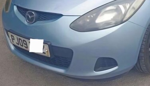 Mazda 2009 1399cc - 2, ts