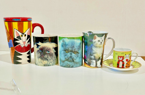 Five mugs cups with cats - five,