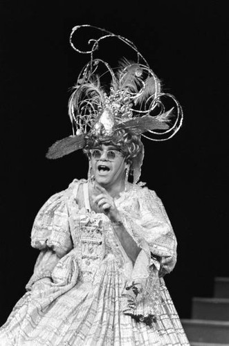Elton john wearing - john,