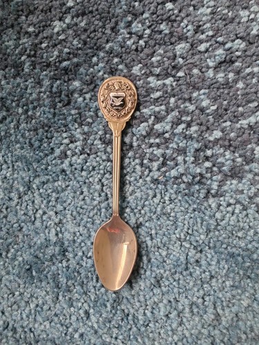 Souvenir spoon featuring logo - souvenir,