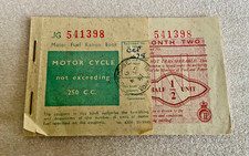 Motor Fuel Ration Book for Motorcycle - 250cc. Issued 1957. First 2 coupons used