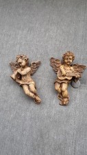 2 vintage-style, carved wooden