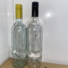 2 empty glass bottles Screw