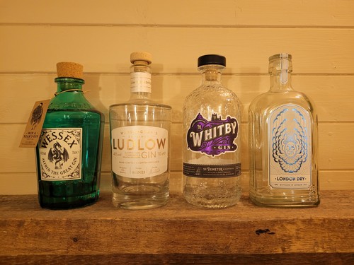 Empty gin bottle - 🍸,