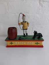 Vintage Cast Iron Trick Dog