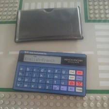 VINTAGE Seiko TR-1100 French-English Translator/Calculator ~ GOOD WORKING ORDER 