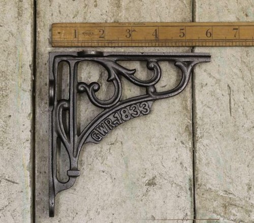 Pair shelf brackets cast - of,
