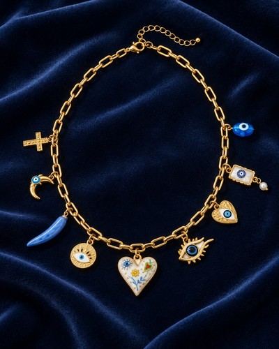 Gold charm necklace with - charm, evil