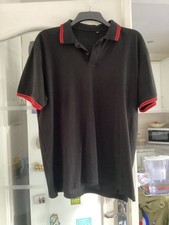 Men’s polo shirt in Black XXL never worn. Bought from Harrington store.