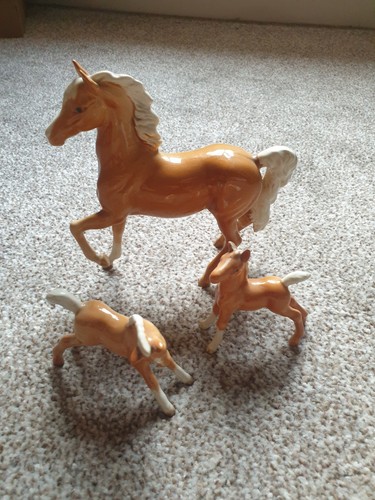 Beswick palomino and - and, foals