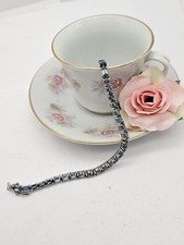 Sterling Silver Sky Blue Topaz D’Joy Tennis Bracelet .