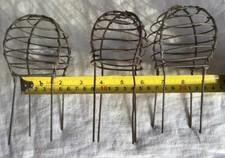 Three old gavanized metal gutter outlet balloons.