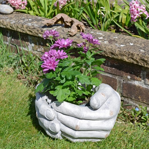 Unusual cupped hands planter - "cupped,