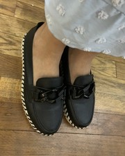 Black leather moccasins