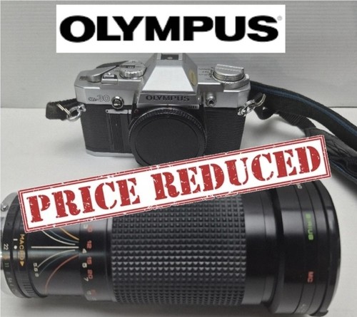 Olympus silver 35mm slr - om-30,