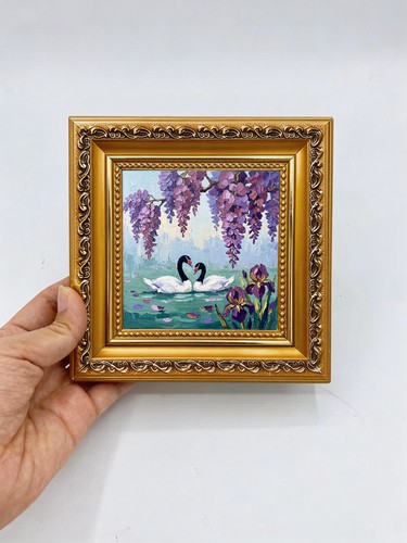 Swans pond with wisteria - swans,