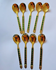 9 demitasse teaspoons gold