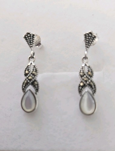 Sterling silver and - silver,