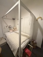 White wooden four poster