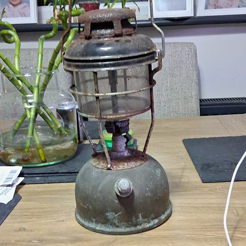 Burning green oil lantern - burning,