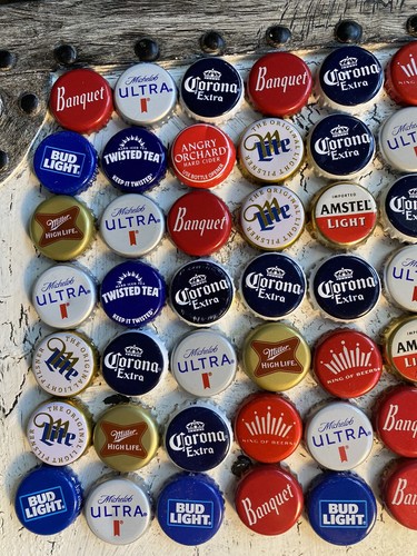 100 assorted beer bottle caps - assorted,