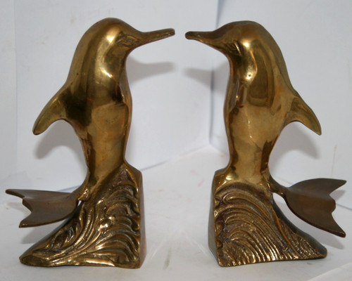 Pair dolphins sitting on - pair, of