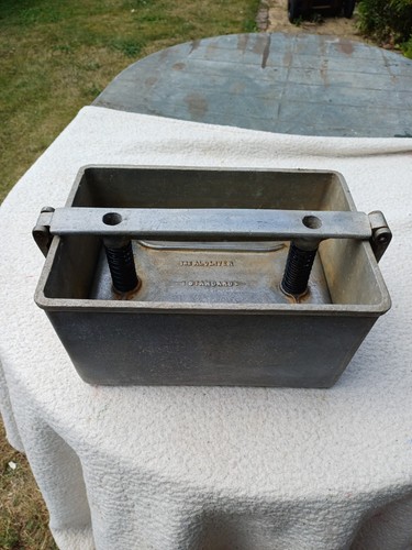 Vintage cast aluminium meat - cast,