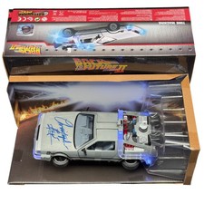 Christopher Lloyd Signed Back