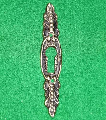 Small narrow brass escutcheon
