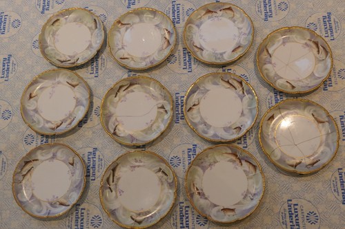 Set eleven 23cm limoges - of,