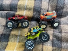 Hot Wheels Monster TruckBundle Unimog Yellow,Dodge Ram Van & Captains Curse