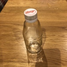Coca Cola Collectible Bottle, vintage and unusual, empty, 250ml size with lid