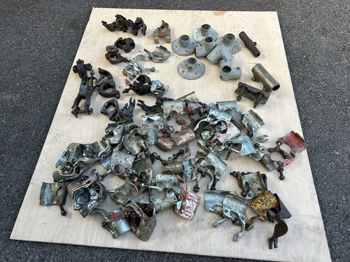 Used scaffolding clips - scaffolding,