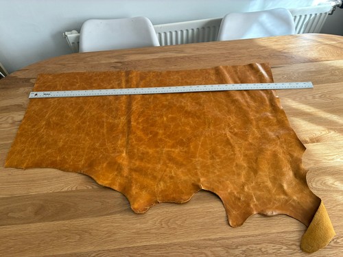 Distressed tan leather cowhide - distressed,