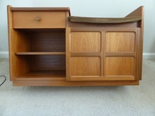 Nathan Teak Cabinet square pattern telephone seat with shelves and drawer.