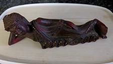 ANTIQUE CARVED HARDWOOD RECUMBENT MANDALAY BUDDHA, BITS OF MIRRORED MOZAIC OFF.
