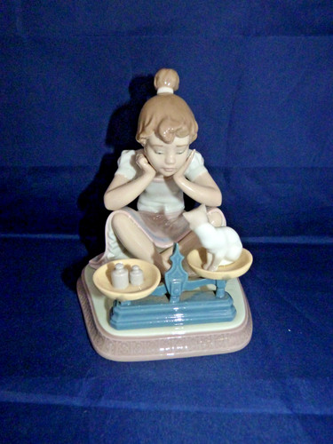 Lladro girl weighing a - weighing, cat