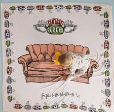 Friends & Orange Couch Luxe