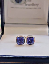 Tanzanite 5mm AAA+ 9k White