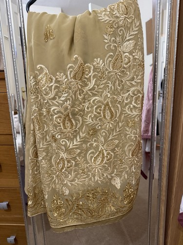 Heavy golden sari - heavy,